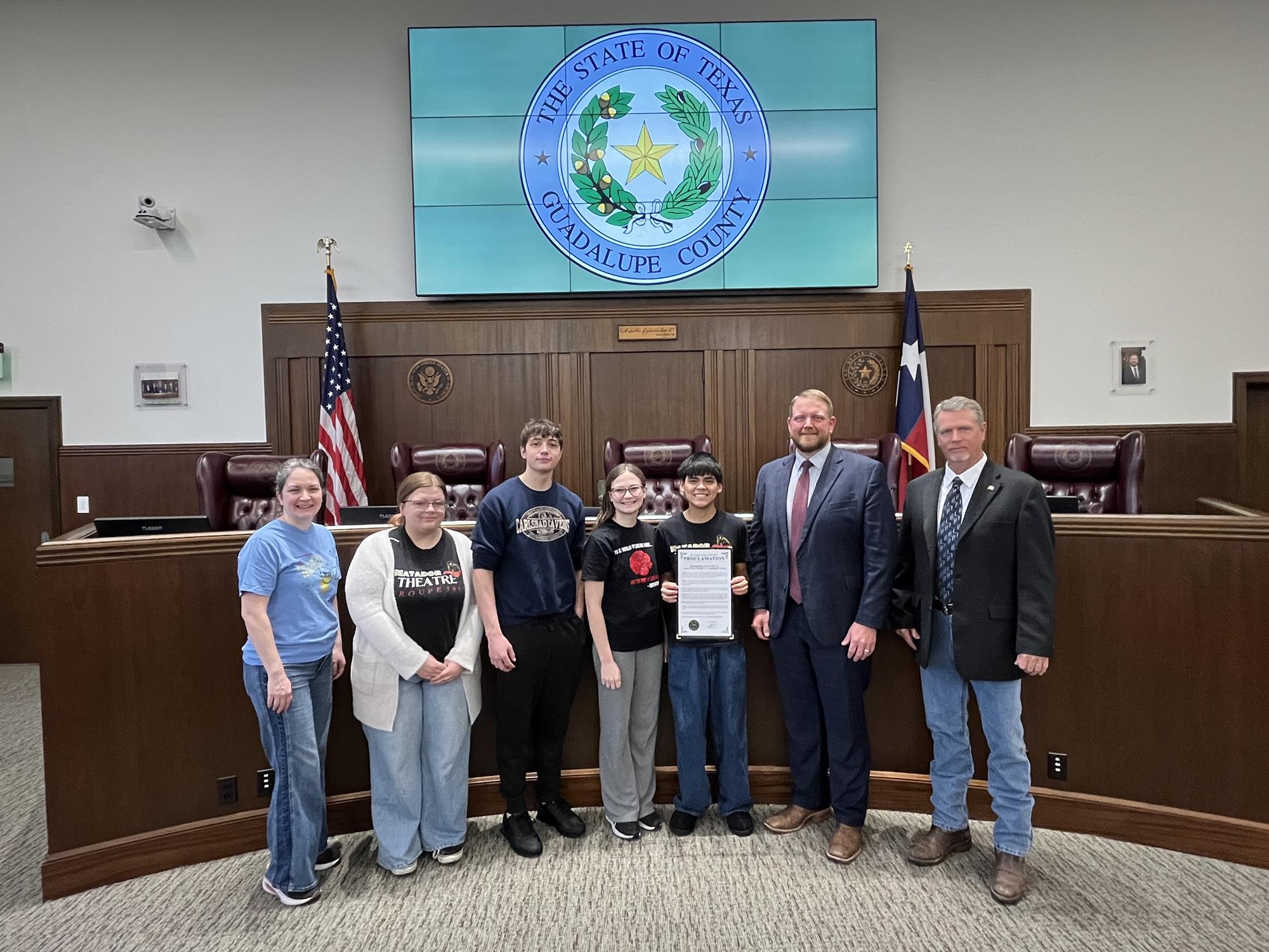 Students from Seguin High School Matador Theatre were presented a Proclamation Recognizing March 2026 as Arts in Our Schools Month. Photo of students taken in Guadalupe County courtroom. 